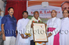 Bishop honours Mangalore South MLA JR Lobo